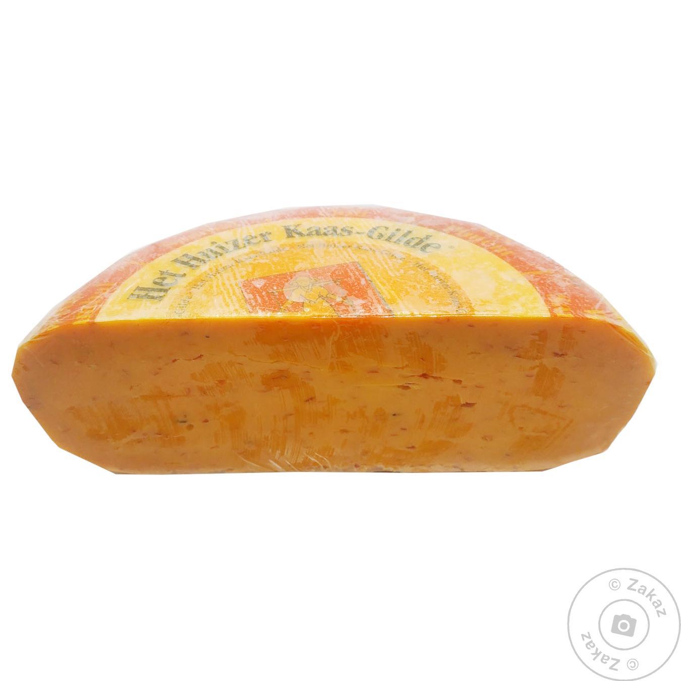 Сир Huizer Kaas-Gilde 50% Гауда з перцем чилі ваг. 
Сир Huizer Kaas-Gilde 50% Гауда з перцем чилі ваг.