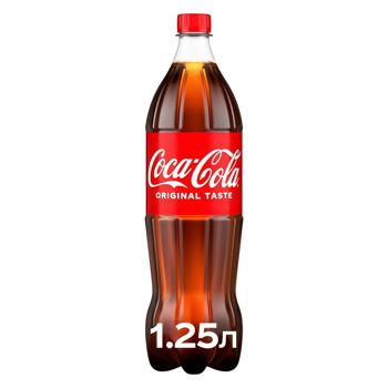 Напій газований Coca-Cola 1,25л - купити, ціни на Ідеал - фото 1
