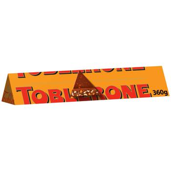 Шоколад молочний Toblerone Orange Twist з імбирною апельсиновою цедрою 360г - купити, ціни на - фото 1