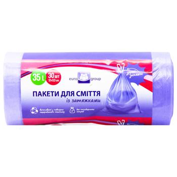 Пакети для сміття Eurogroup із затягуванням фіолетові 35л 30шт - купити, ціни на КОСМОС - фото 1