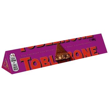 Шоколад молочный Toblerone с изюмом и медово-миндальным нугой 100г - купить, цены на NOVUS - фото 1
