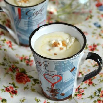 Creamy drink with white chocolate and nuts